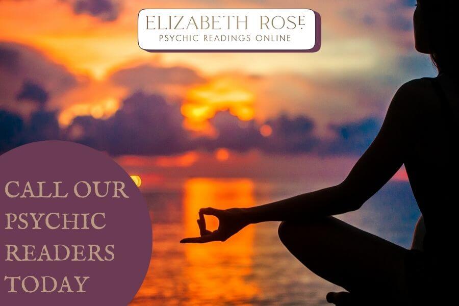 ER Psychic Website A Woman meditating in the sunset with Elizabeth Rose branded on top